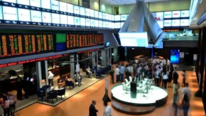 Bolsa abre após atraso; dólar sobe com Fed e balanços